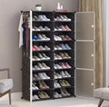 Black modular shoe storage cabinet with translucent doors open and footwear neatly organised