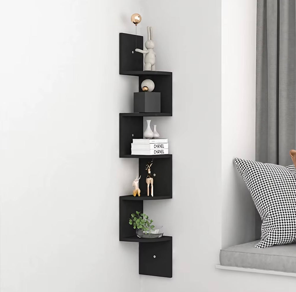 Black wall-mounted corner shelf with five curved display tiers