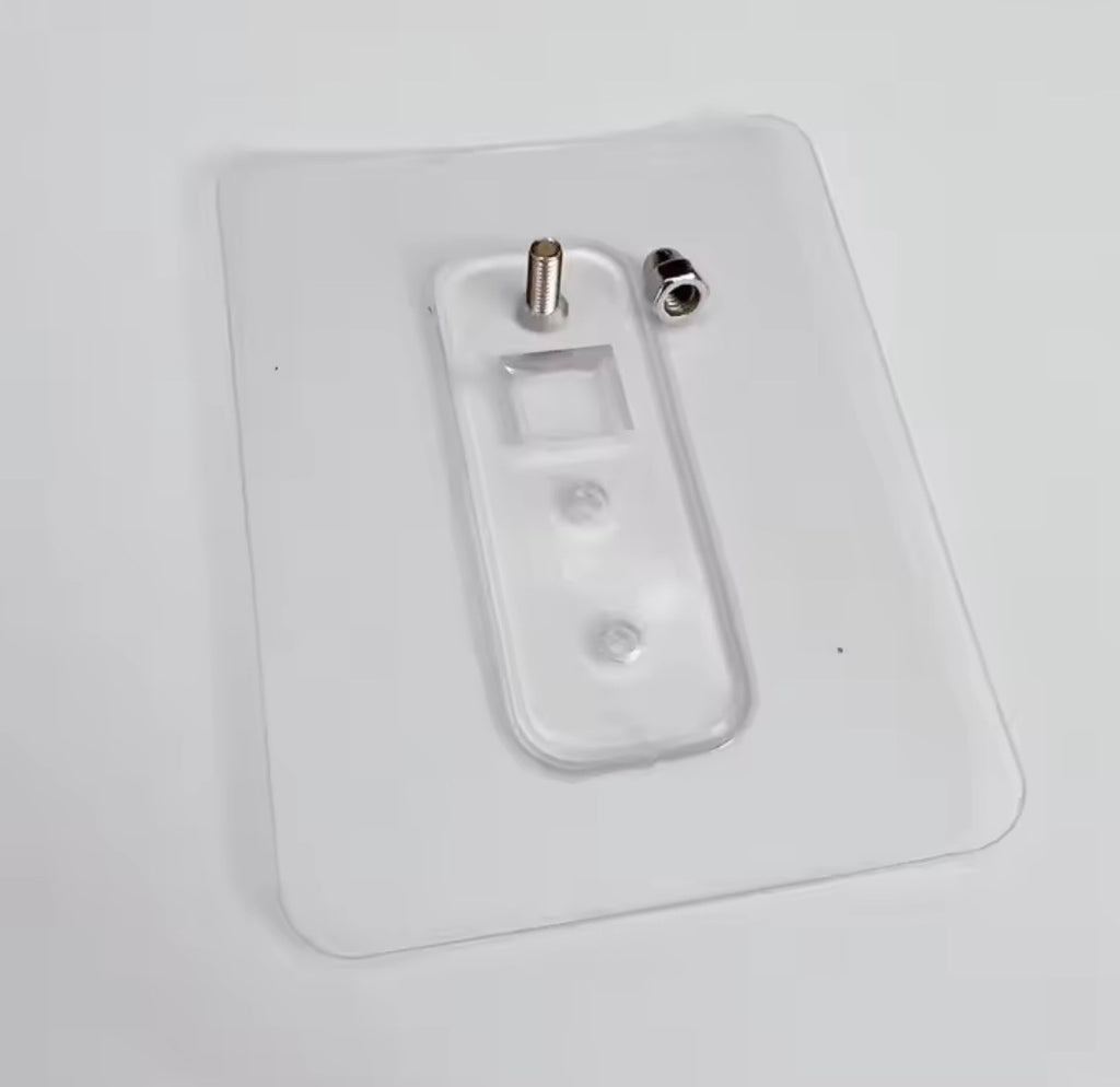 Transparent adhesive mounting pad and fixing bolt for wall-mounted bathroom shelf