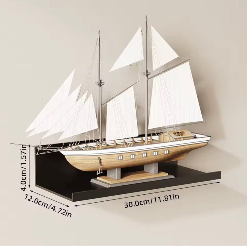 Black metal picture ledge shelf displaying a model boat