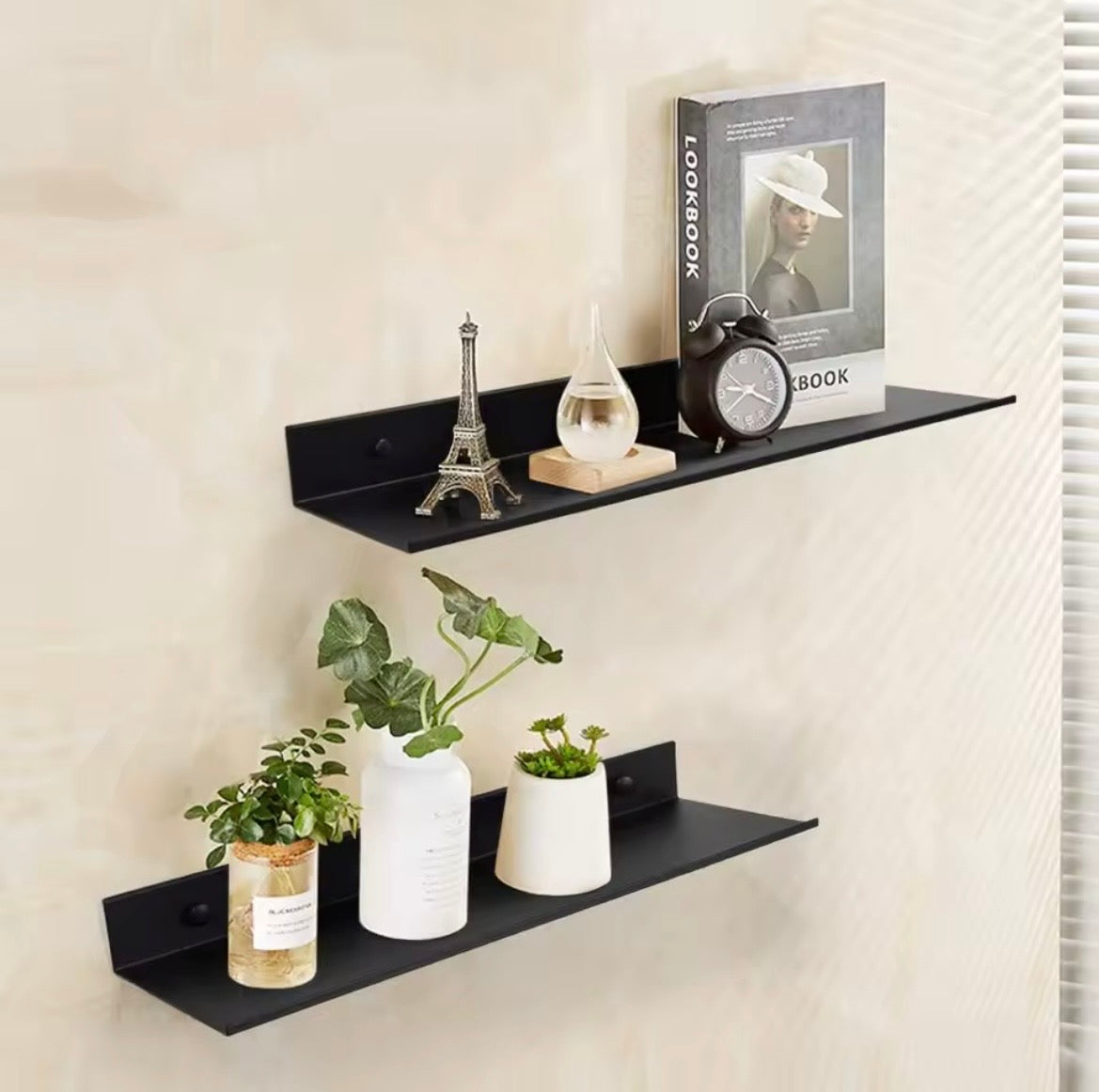 Black metal picture ledge wall shelf used for decor