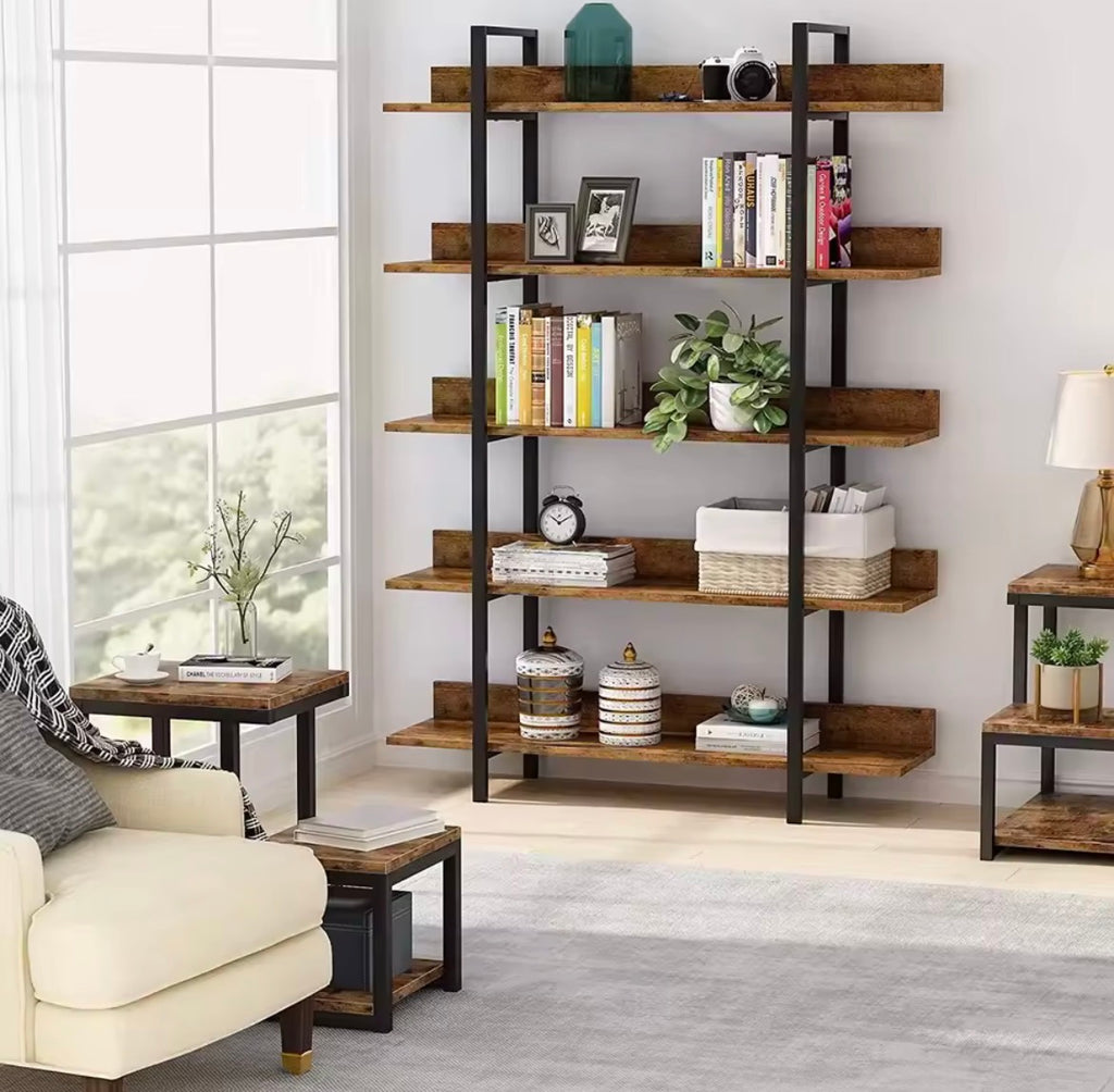 Tall brown and black five-tier industrial bookcase styled in a bright living room