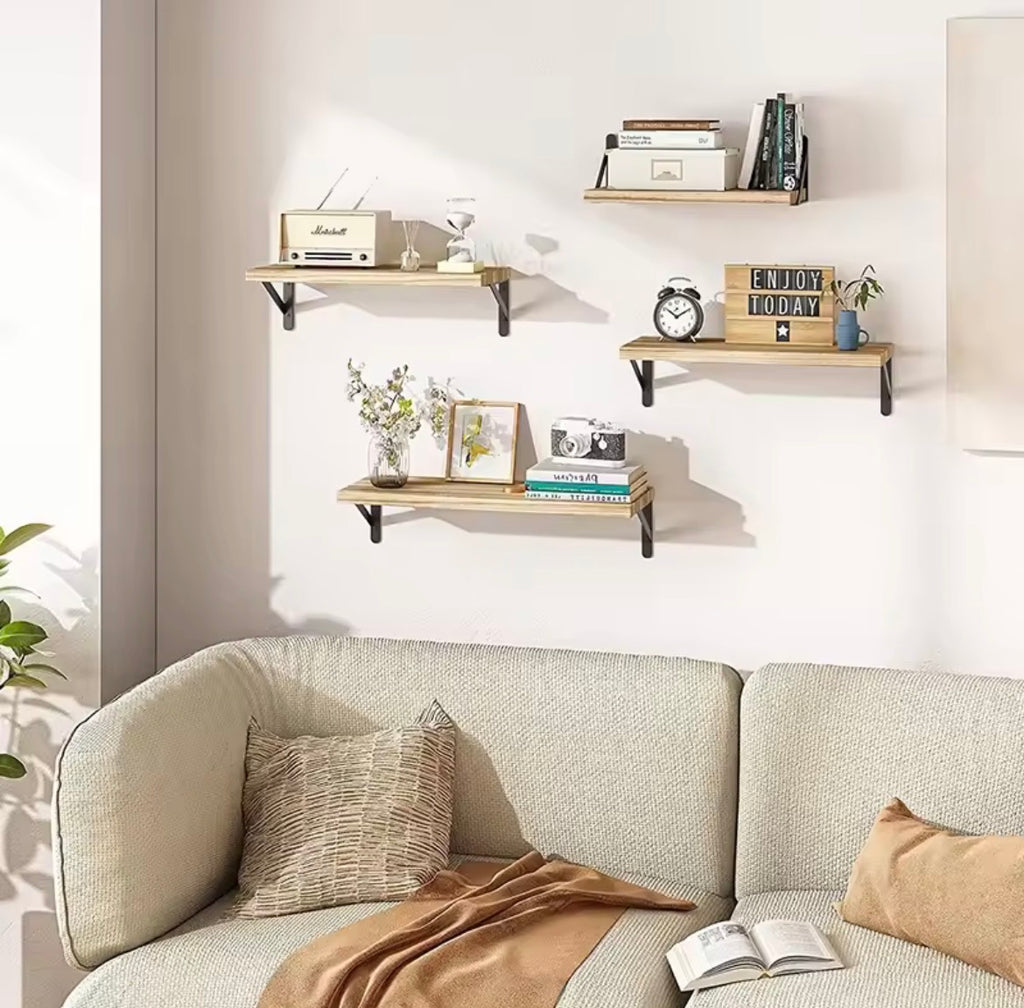 Wooden floating wall shelves in a living room display