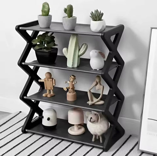 Black 4 tier X type storage rack used as display shelf