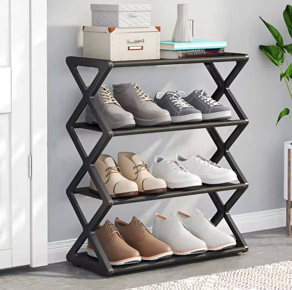 Black 4 tier X type shoe storage rack in hallway